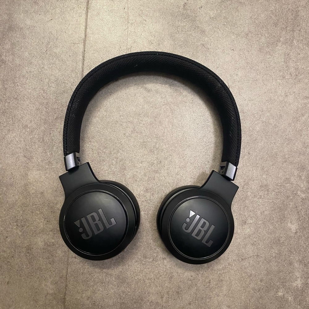 Over the ear JBL headphones.